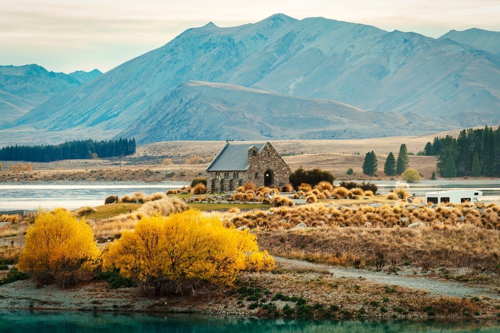The stone Church of the Good Shepherd at Lake Tekapo with the mountains behind