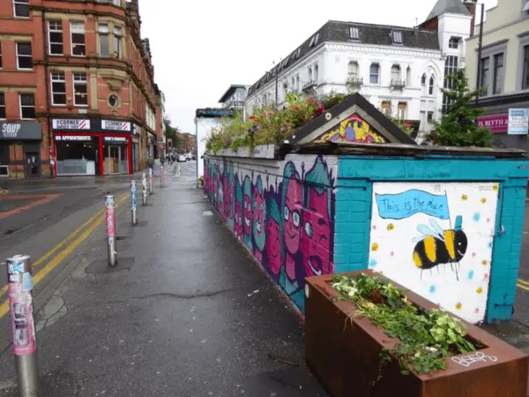 Things to Do in Manchester - The 18 Best Sights & Experiences in the City of Football and Music 7 Street art featuring the worker bee in the Northern Quarter, Manchester