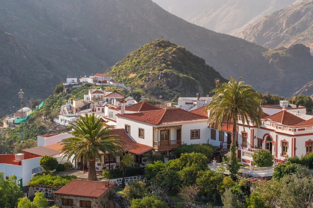 17 Best Things to Do in Gran Canaria: Sights, Prices & Tips 7 The mountain village of Tejeda seen from above with Roque Nublo at sunset