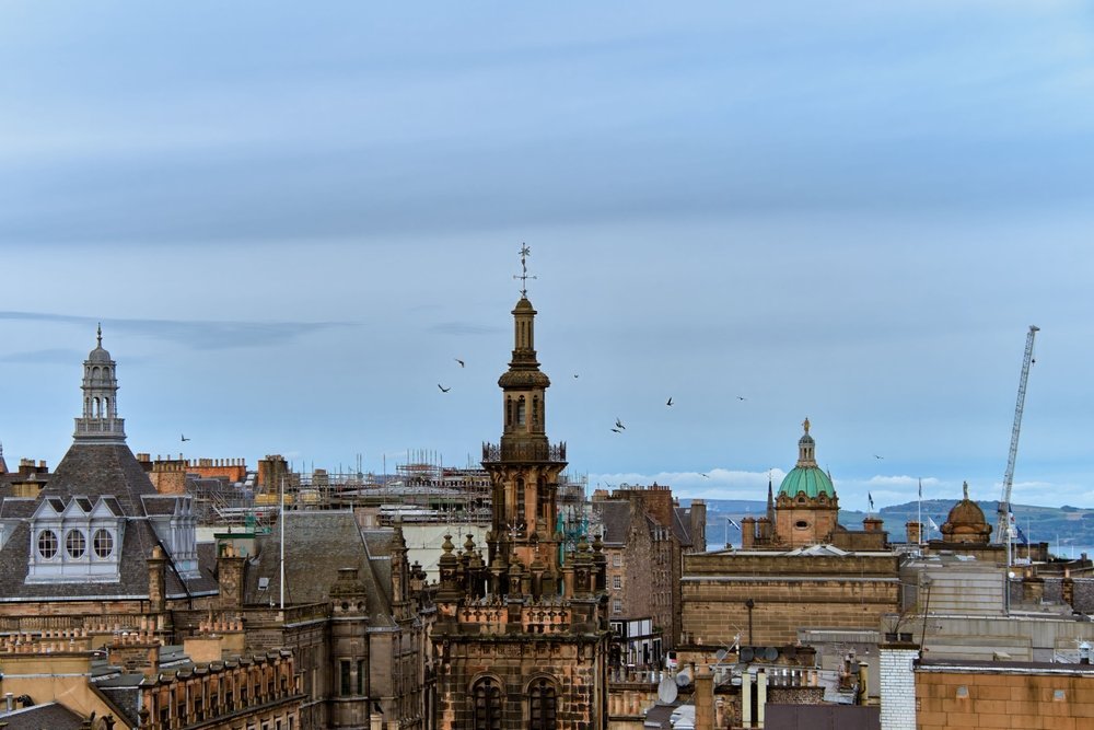 Historic sandstone buildings and rooftops in central Glasgow