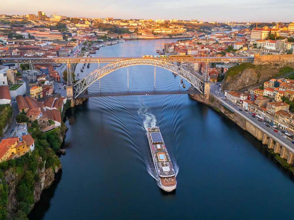 Drone view over the River Douro in Porto with the Dom Luís I Bridge, Ribeira and Vila Nova de Gaia