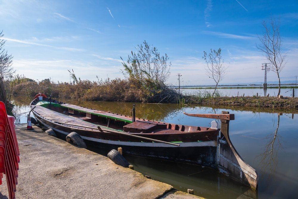 Traditional Albufera boat at the jetty in El Palmar