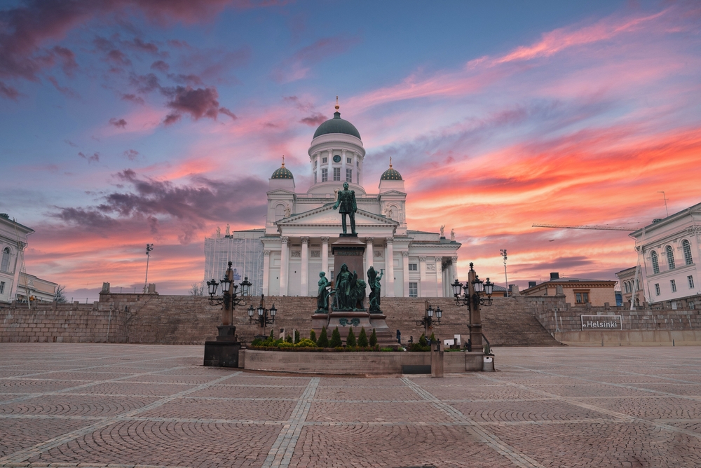 Helsinki Cathedral with its green domes on Senate Square at sunset