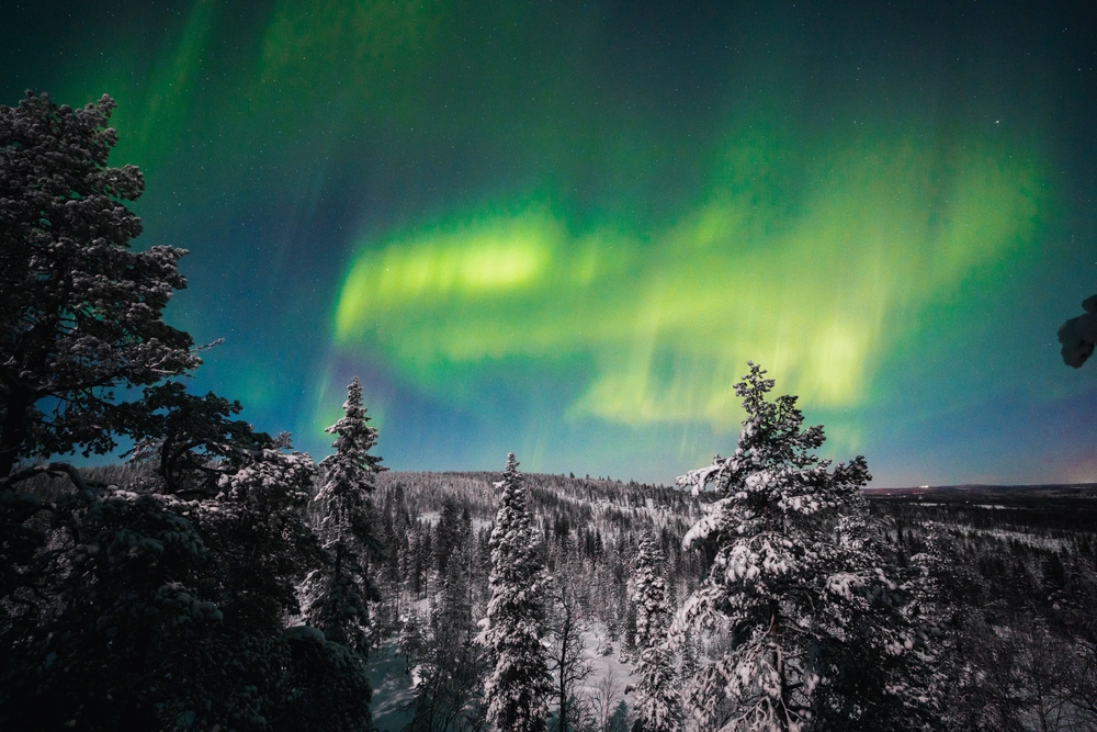 Green northern lights over Rovaniemi in Finnish Lapland