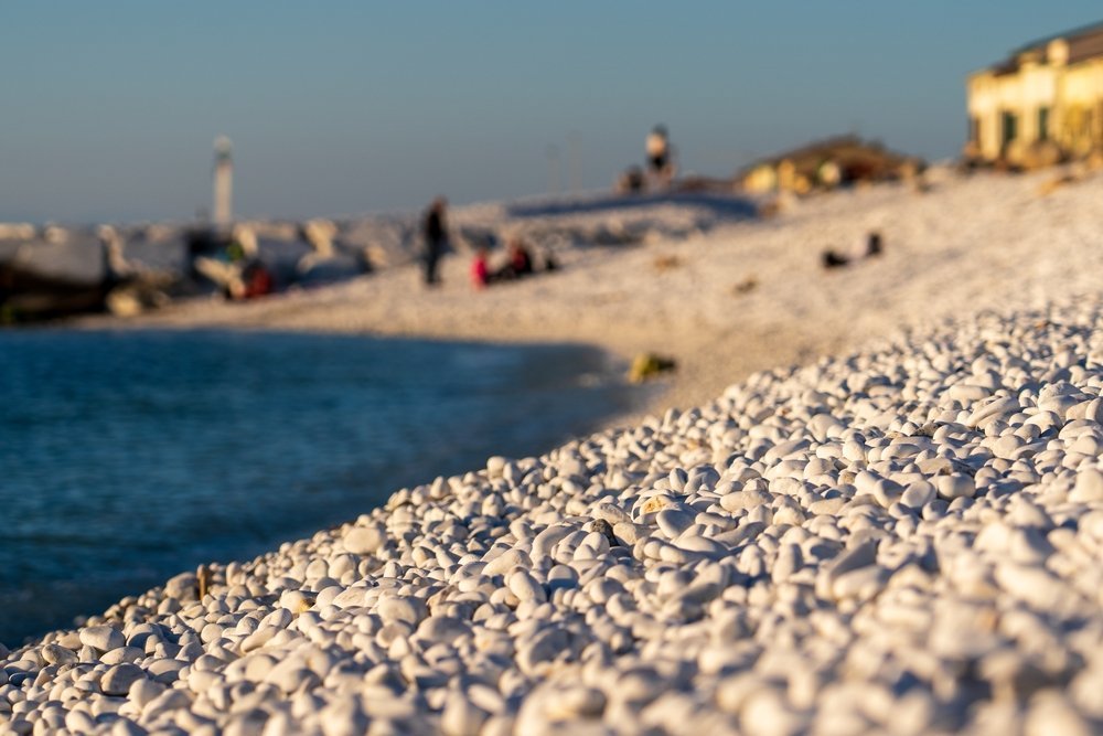 Where to Stay in Pisa? The 5 Best Areas & Places to Stay 6 The white pebble beach and breakwaters in Marina di Pisa