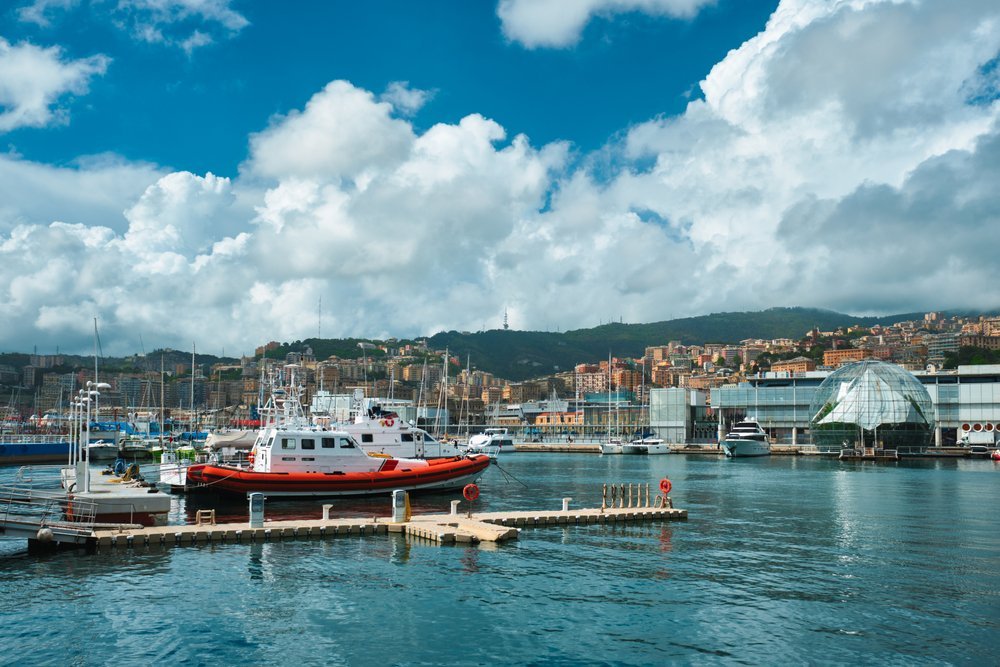 Yachts in Porto Antico with the Biosfera by the aquarium in Genoa