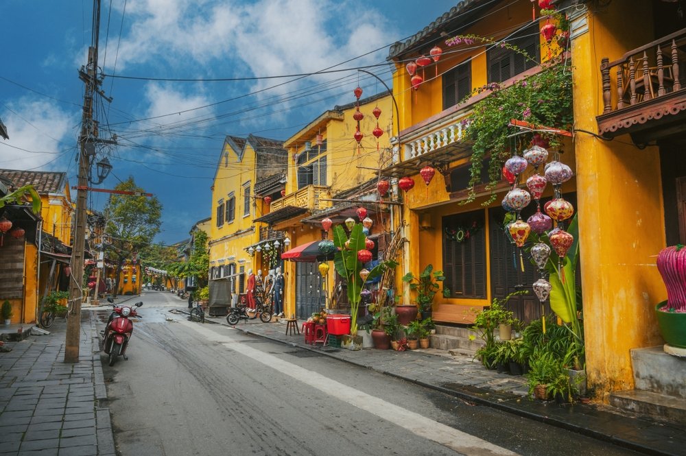 Yellow houses and paper lanterns on a street in the Old Town of Hoi An